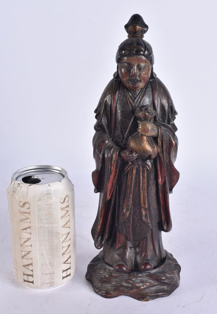AN 18TH CENTURY CHINESE POLYCHROMED WOOD LACQUERED FIGURE OF AN IMMORTAL Qing. 27cm high.: AN 18TH CENTURY CHINESE POLYCHROMED WOOD LACQUERED FIGURE OF AN IMMORTAL Qing. 27cm high.
