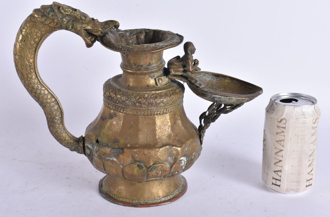 AN 18TH CENTURY TIBETAN NEPALESE BRONZE COPPER ALLOY EWER with dragon handle. 24 cm x 24 cm. (1 of 8)