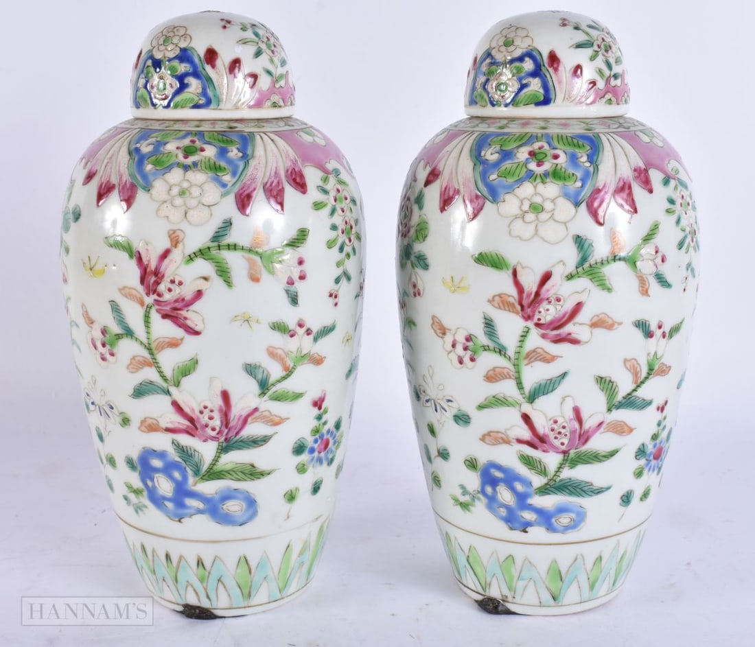 A PAIR OF EARLY 20TH CENTURY JAPANESE AO KUTANI PORCELAIN VASES AND COVERS painted with flowers. 21. (1 of 5)