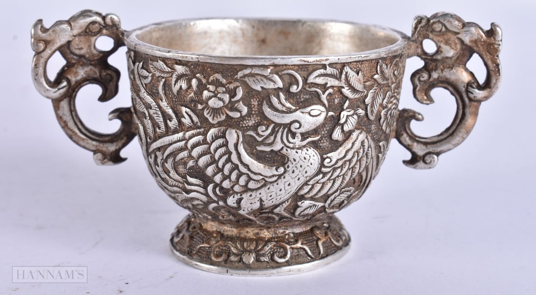 A CHINESE TWIN HANDLED WHITE METAL CUP. 8.5 cm wide. (1 of 5)
