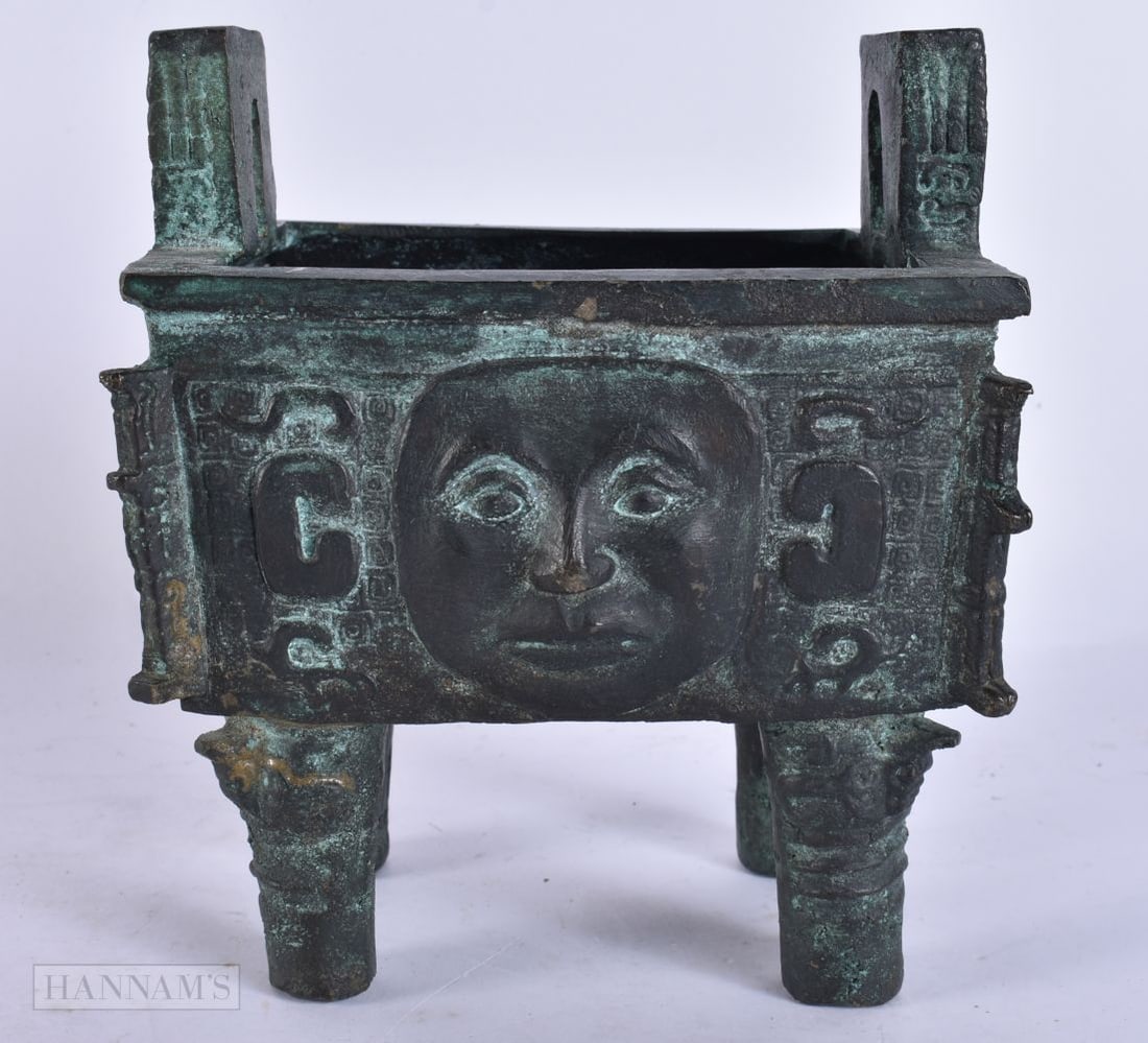 A CHINESE TWIN HANDLED BRONZE CENSER. 17 cm wide. (1 of 5)