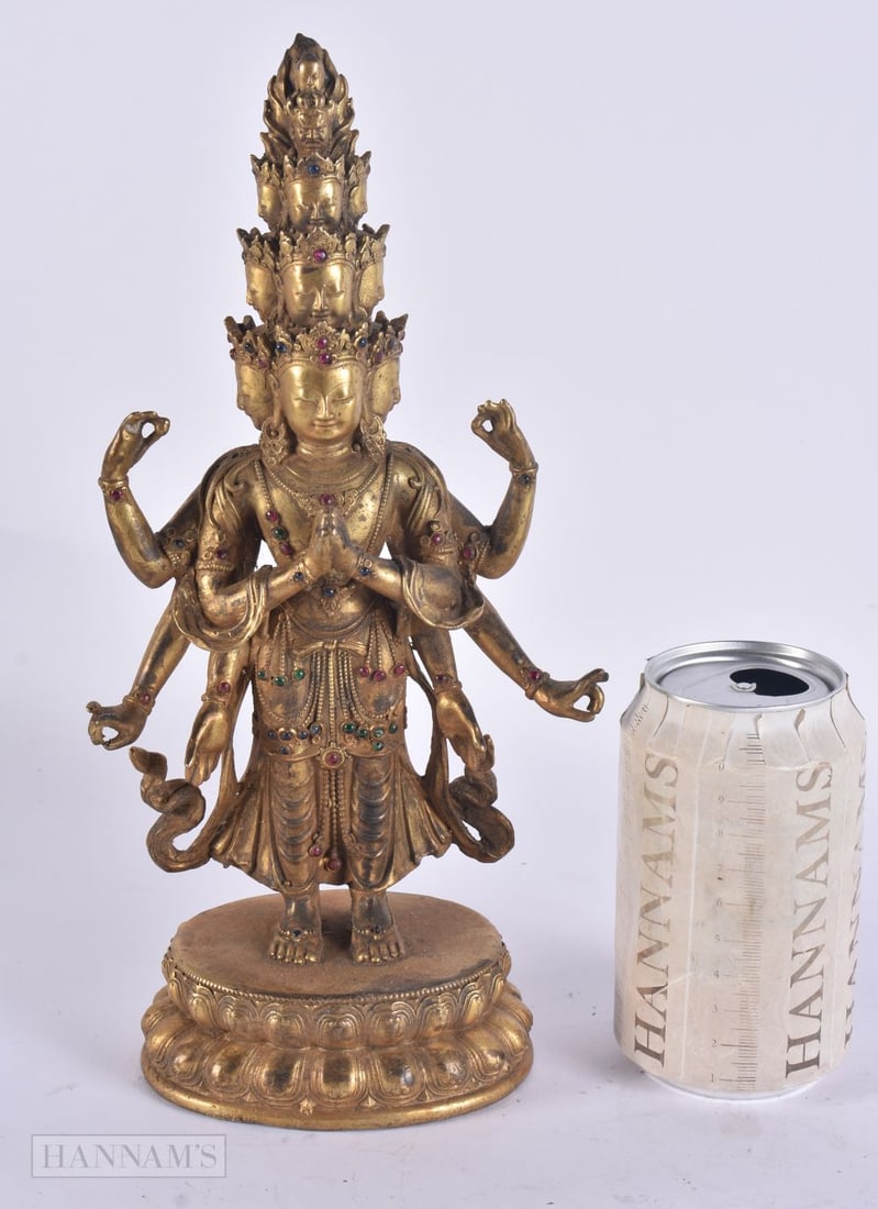 A CHINESE TIBETAN JEWELLED BRONZE BUDDHA. 28cm high.: A CHINESE TIBETAN JEWELLED BRONZE BUDDHA. 28cm high.