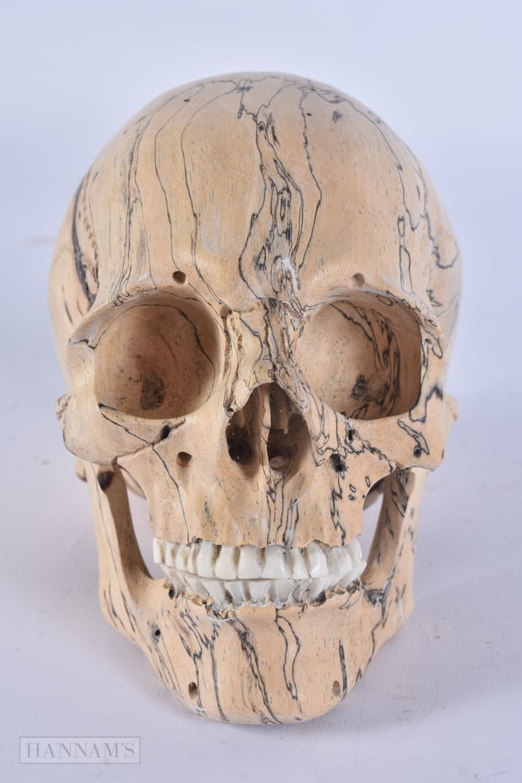 A MEMENTO MORI WOOD SKULL. 14cm x 12 cm. (1 of 4)