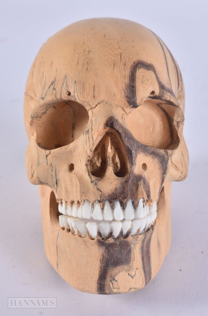 A MEMENTO MORI BONE AND WOOD SKULL. 9 cm x 11 cm. (1 of 4)