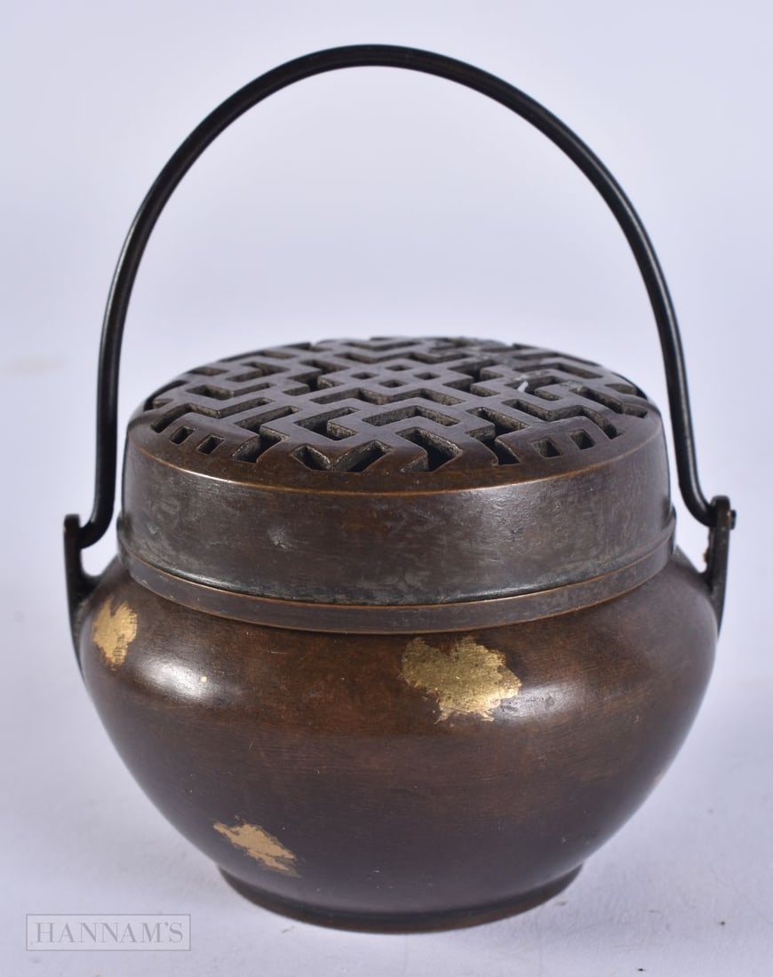 A CHINESE GOLD SPLASH BRONZE CENSER. 9 cm high inc handle. (1 of 5)