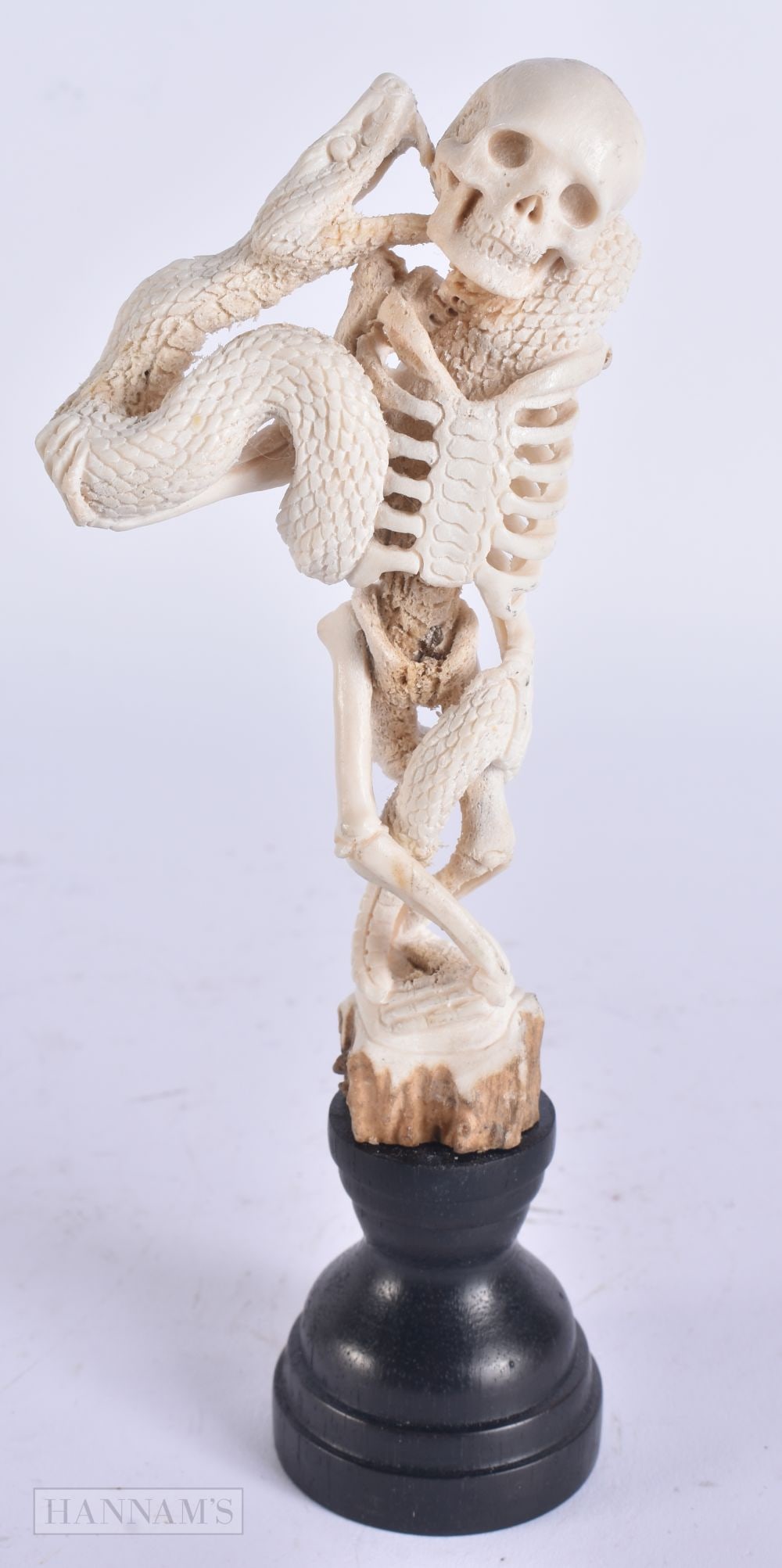 A MEMENTO MORI STAG ANTLER SKELETON AND SNAKE. 19 cm high.: A MEMENTO MORI STAG ANTLER SKELETON AND SNAKE. 19 cm high.