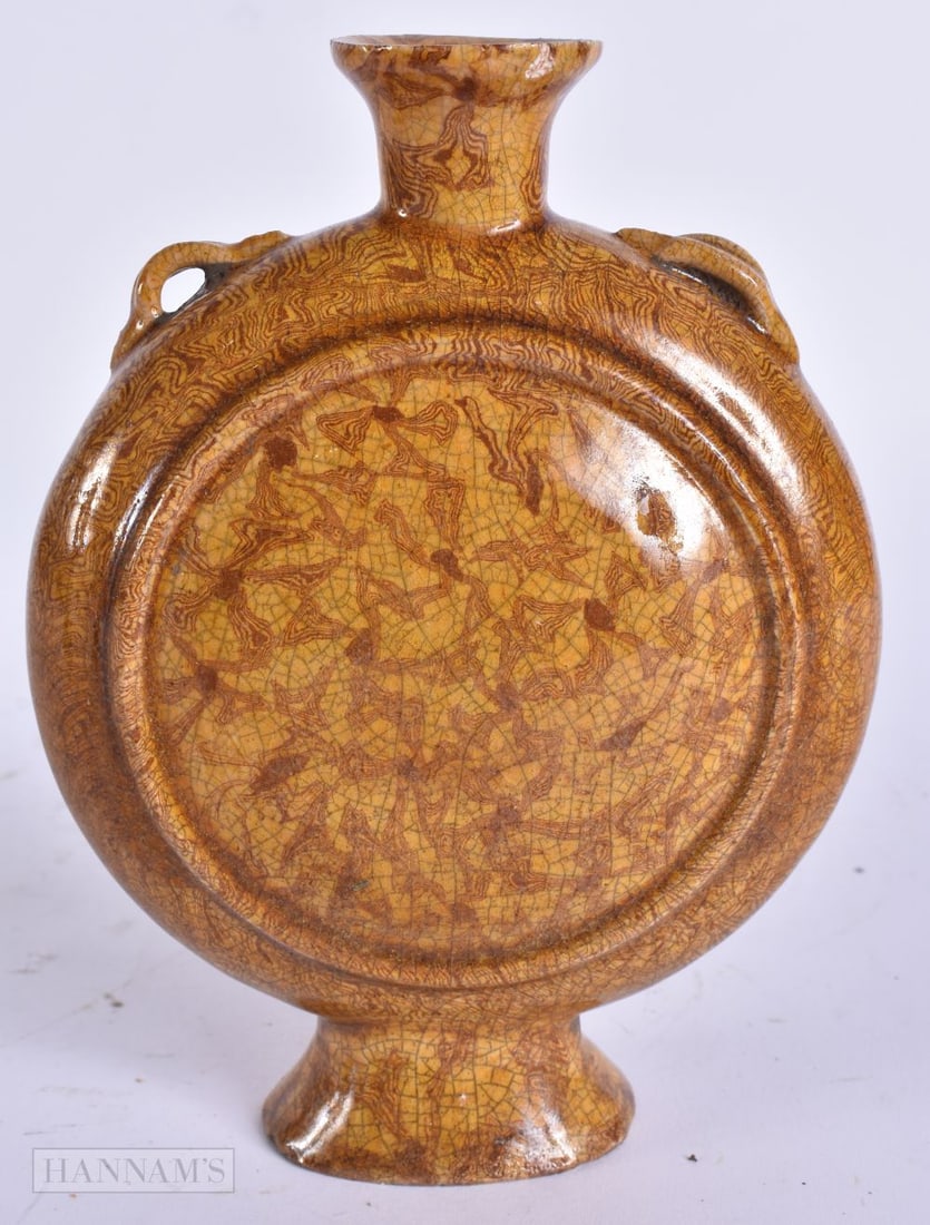 A CHINESE MARBLEISED POTTERY PILGRIM FLASK. 16 cm high.: A CHINESE MARBLEISED POTTERY PILGRIM FLASK. 16 cm high.