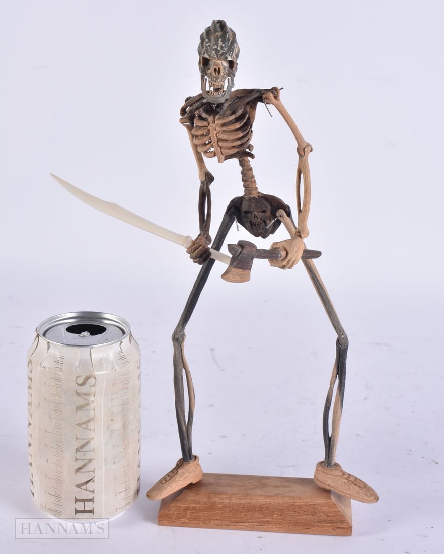 A MEMENTO MORI CARVED WOOD SKELETON. 32 cm high.: A MEMENTO MORI CARVED WOOD SKELETON. 32 cm high.