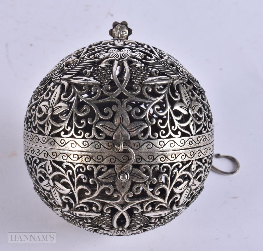 A CHINESE WHITE METAL HANGING CENSER. 9.5 cm wide.: A CHINESE WHITE METAL HANGING CENSER. 9.5 cm wide.