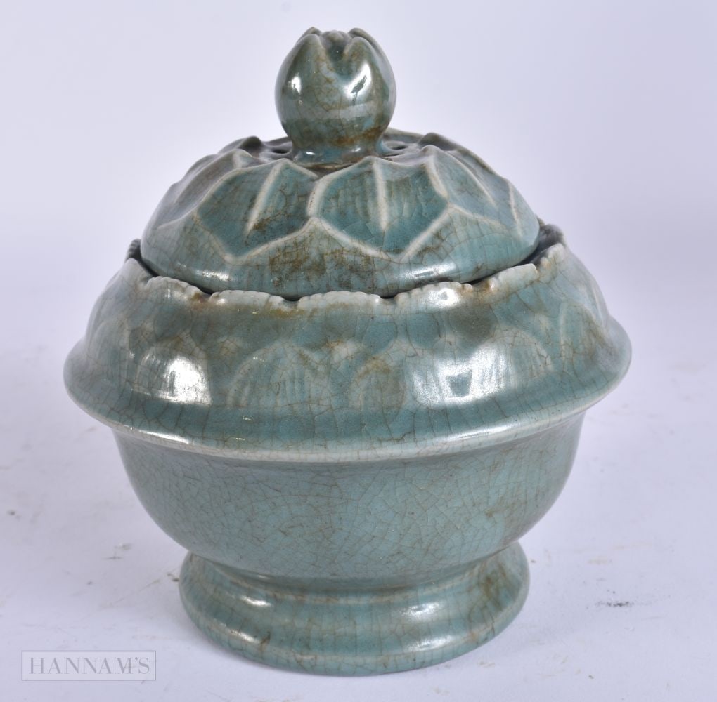 A CHINESE CELADON POTTERY CENSER AND COVER. 13 cm high.: A CHINESE CELADON POTTERY CENSER AND COVER. 13 cm high.