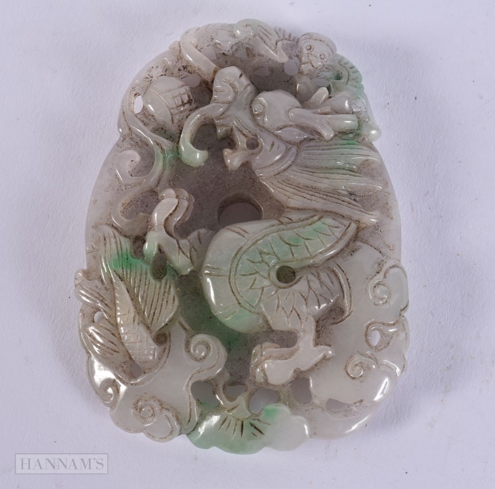 A CHINESE JADE PLAQUE. 130 grams. 9.25 cm x 7 cm. (1 of 4)