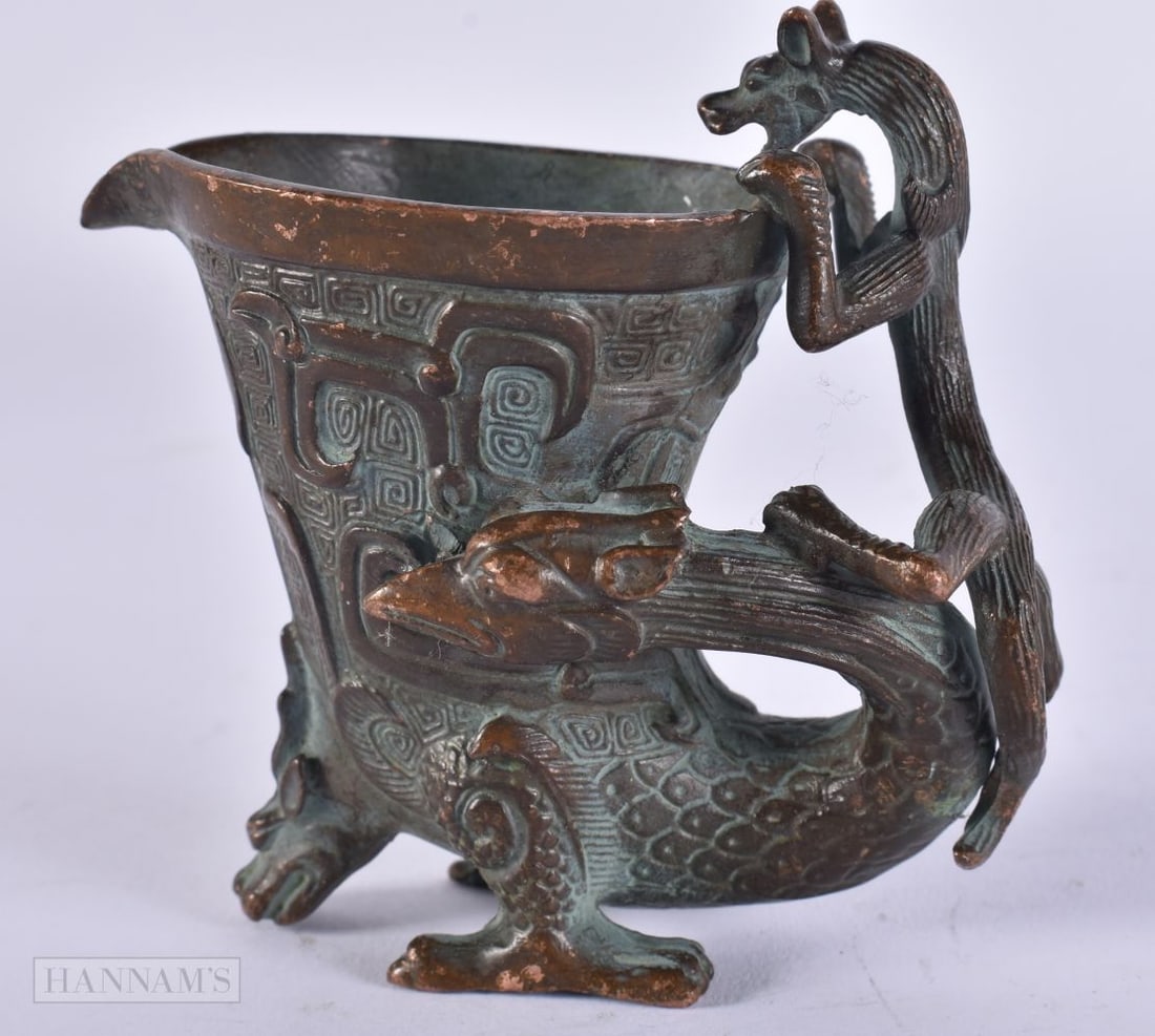 A CHINESE BRONZE JUE BEAST CUP. 371 grams. 9 cm x 8.5 cm. (1 of 5)