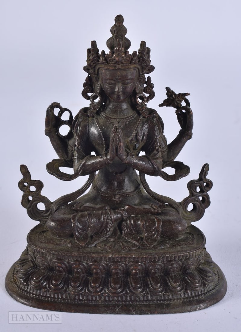 A TIBETAN BRONZE BUDDHA. 251 grams. 10 cm x 8.5 cm. (1 of 5)