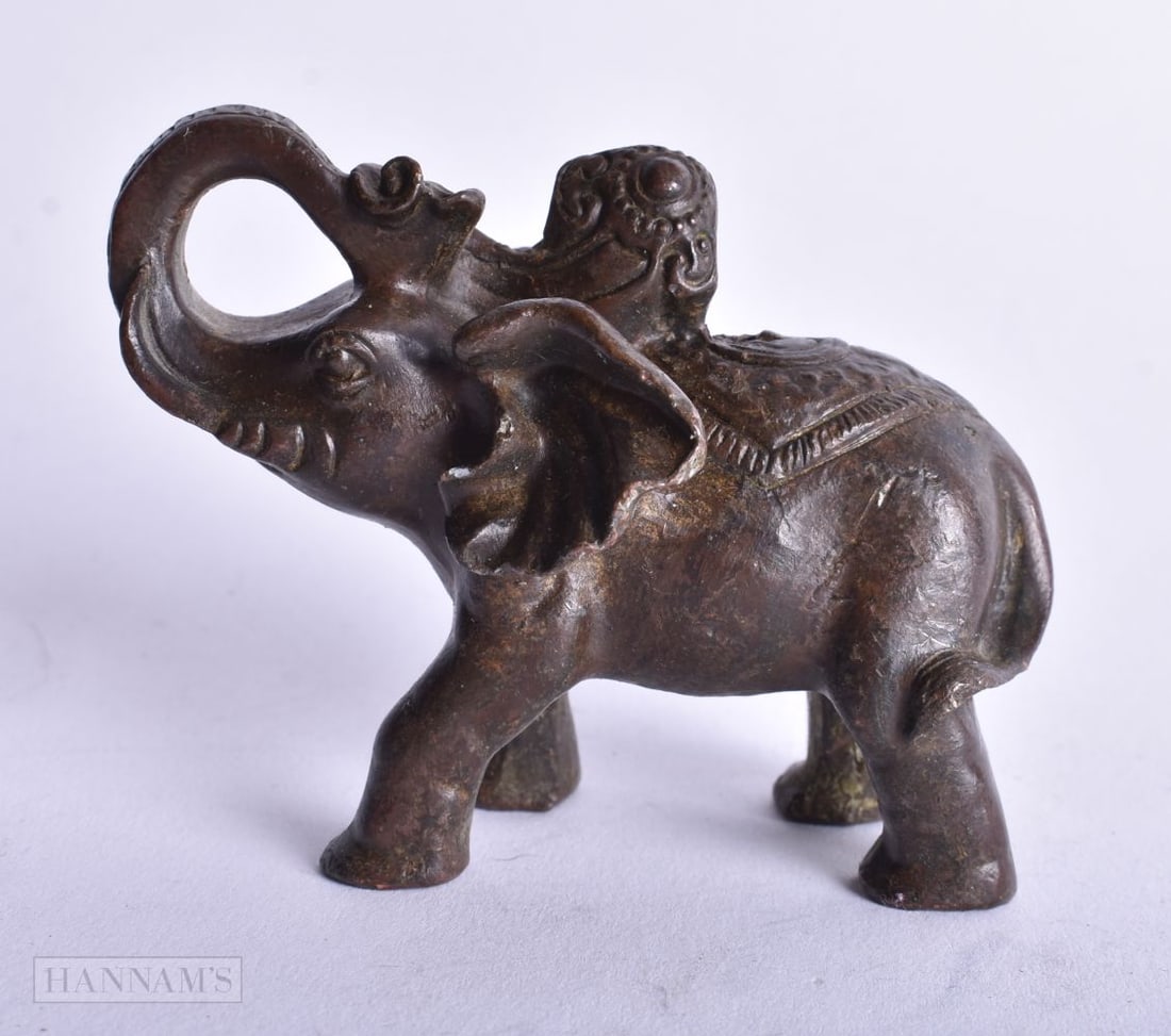 A JAPANESE BRONZE ELEPHANT. 313 grams. 7.5 cm x 6 cm. (1 of 4)