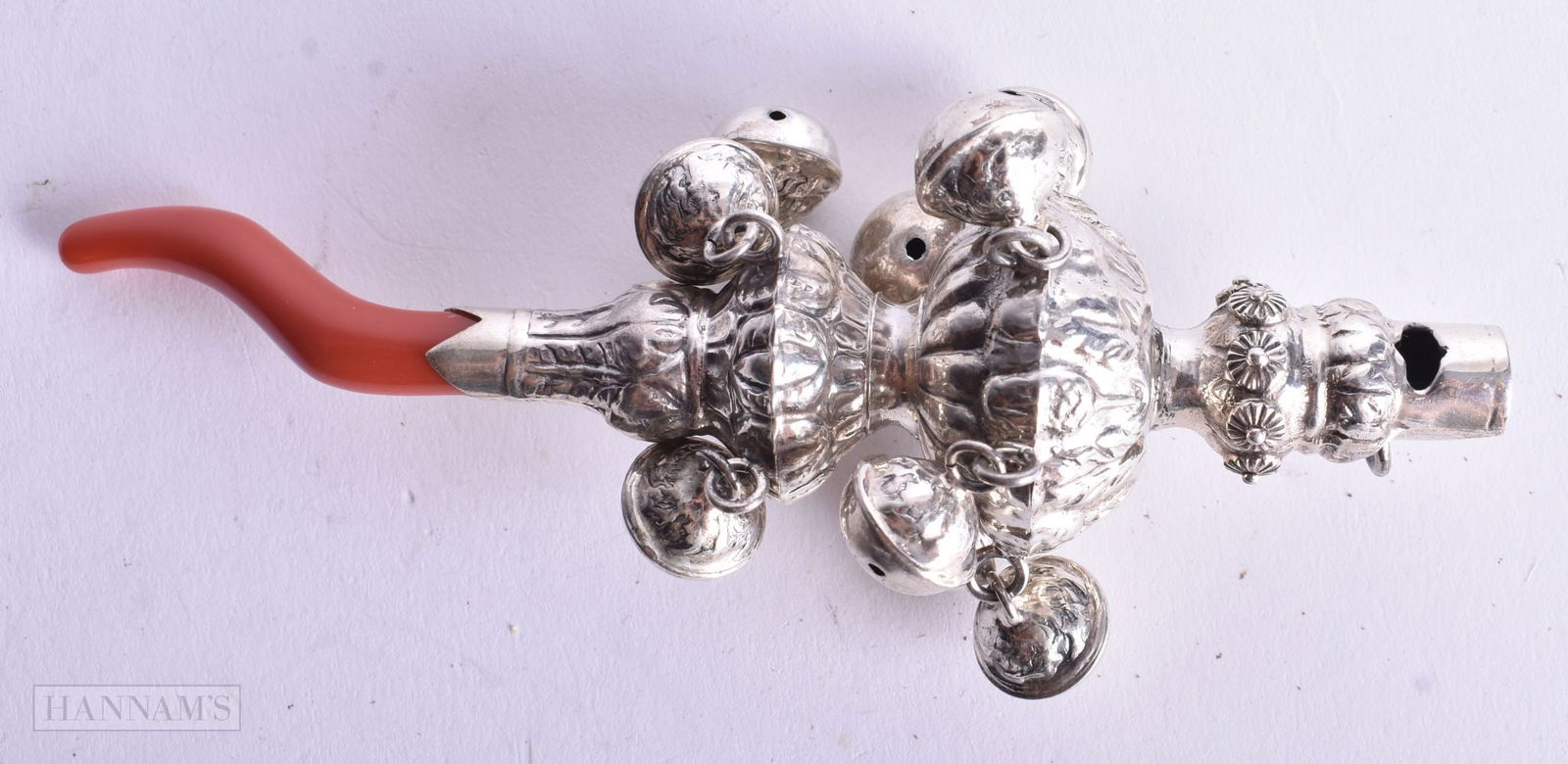 A SILVER BABIES RATTLE. 59 grams. 14cm long,: A SILVER BABIES RATTLE. 59 grams. 14cm long,