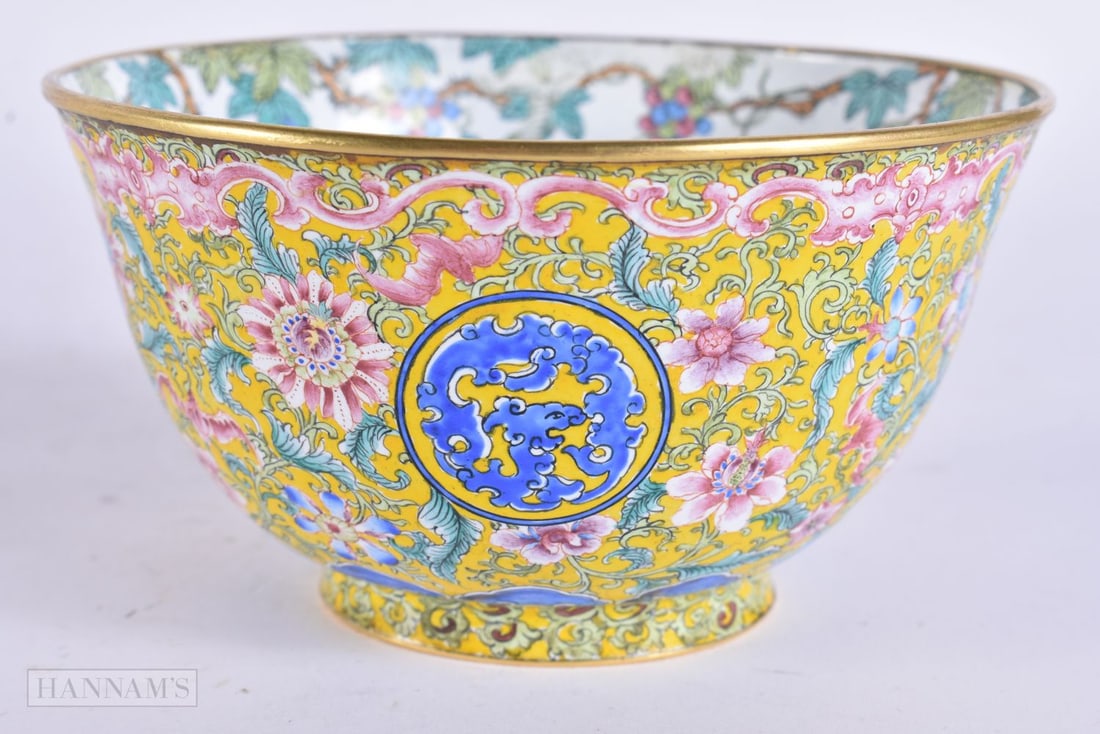 A FINE CHINESE QING DYNASTY CANTON ENAMEL BOWL painted with flowers and dragon motifs. 11 cm wide. (1 of 5)