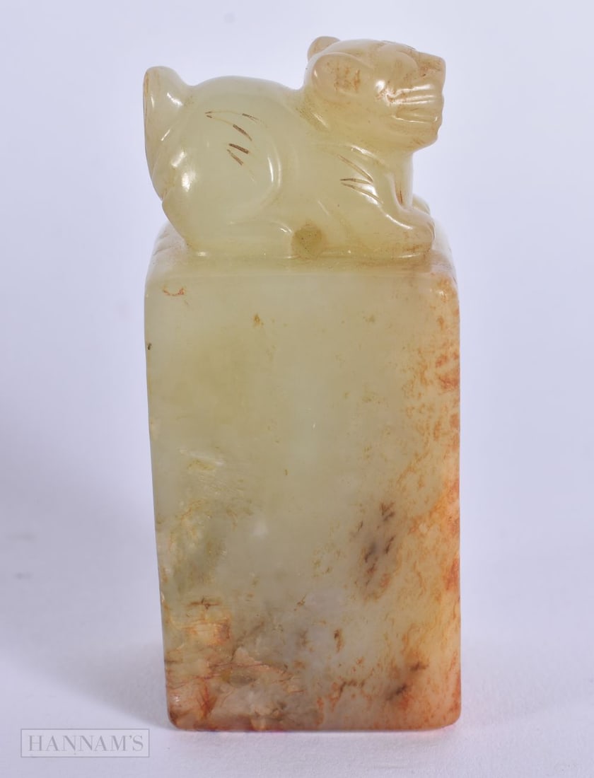 A CHINESE QING DYNASTY CARVED GREENISH WHITE JADE BEAST SEAL. 6.25 cm high. (1 of 6)
