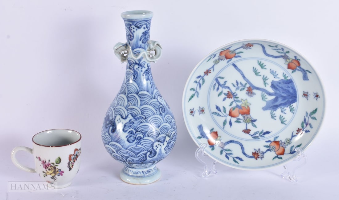 A CHINESE DOUCAI DISH together with a blue and white vase and an 18th century English coffee can. (3 (1 of 7)