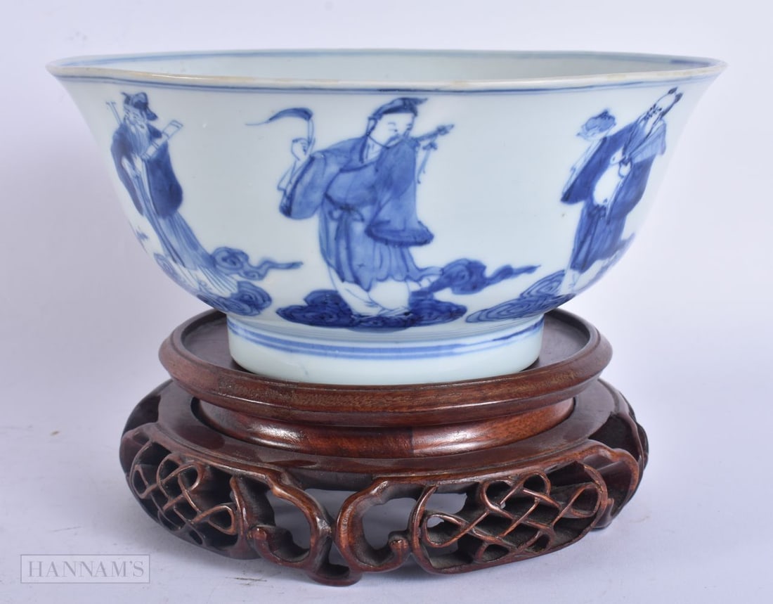 AN 18TH CENTURY CHINESE BLUE AND WHITE PORCELAIN BOWL Qianlong mark and period, painted with immorta: AN 18TH CENTURY CHINESE BLUE AND WHITE PORCELAIN BOWL Qianlong mark and period, painted with immortals. 20 cm x 9 cm.