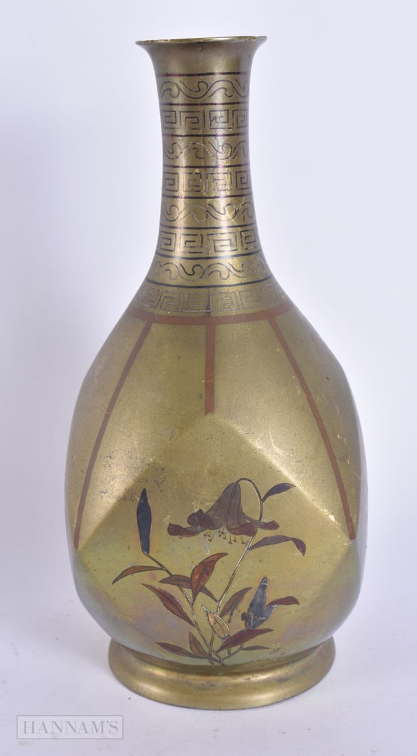 A 19TH CENTURY JAPANESE MEIJI PERIOD MIXED METAL VASE decorated with foliage. 19 cm high.: A 19TH CENTURY JAPANESE MEIJI PERIOD MIXED METAL VASE decorated with foliage. 19 cm high.