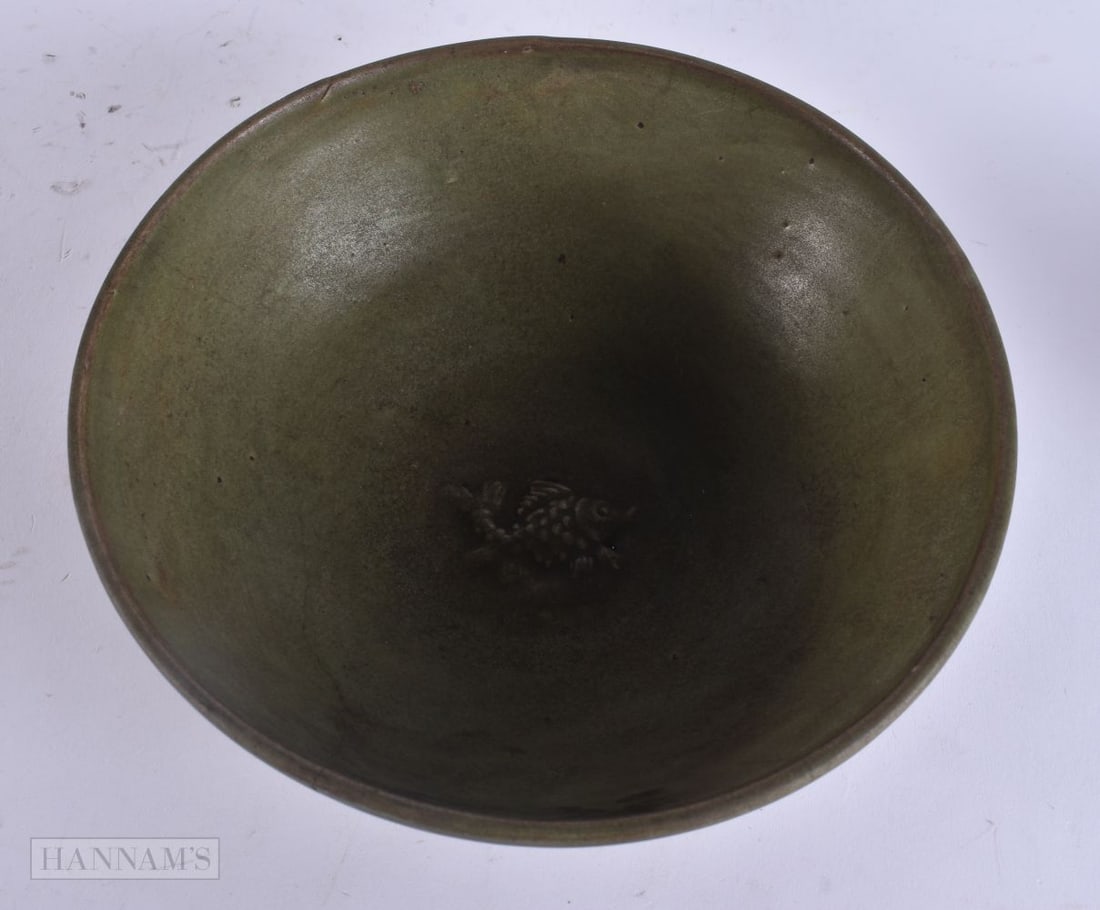 AN EARLY CHINESE CELADON FISH BOWL Yuan/Ming. 19 cm wide.: AN EARLY CHINESE CELADON FISH BOWL Yuan/Ming. 19 cm wide.