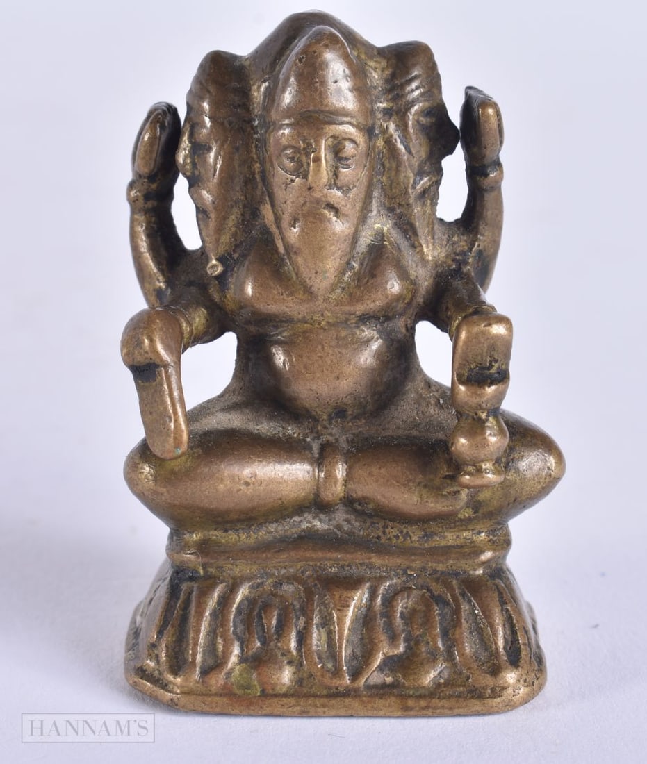 A RARE 19TH CENTURY INDIAN BRONZE FOUR HEADED HINDU DEITY. 5.75 cm x 3 cm. (1 of 12)
