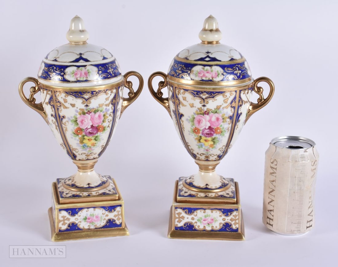 A PAIR OF JAPANESE NORITAKE PORCELAIN VASES AND COVERS. 27.5 cm high. (1 of 6)