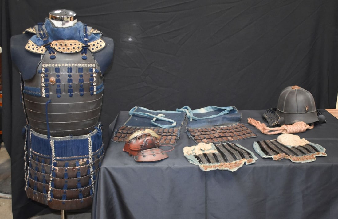 A Japanese Edo period Samurai suit of Armour including a eight plate Kabuto with lining and original (1 of 20)