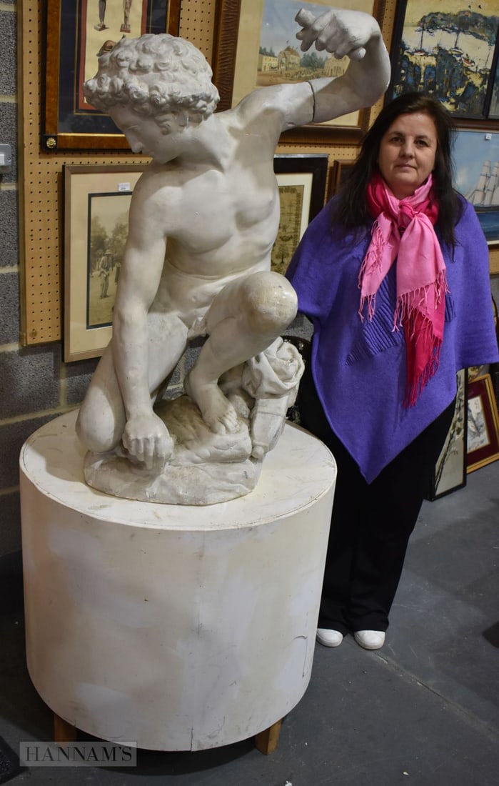 A MONUMENTAL COUNTRY HOUSE PLASTER FIGURE OF THE DISCUS THROWER. Figure excluding base 103 cm x 48 c: A MONUMENTAL COUNTRY HOUSE PLASTER FIGURE OF THE DISCUS THROWER. Figure excluding base 103 cm x 48 cm.