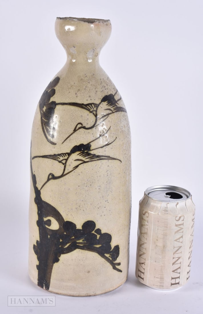 A JAPANESE STUDIO POTTERY SAKE BOTTLE. 31 cm high.: A JAPANESE STUDIO POTTERY SAKE BOTTLE. 31 cm high.