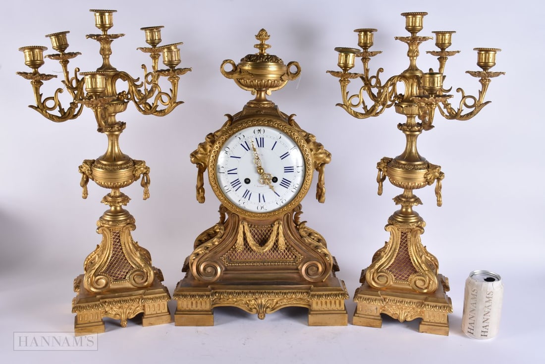 A FINE LARGE 19TH CENTURY FRENCH ORMOLU CLOCK GARNITURE with lion mask heads. 60 cm x 22 cm. (3) (1 of 10)