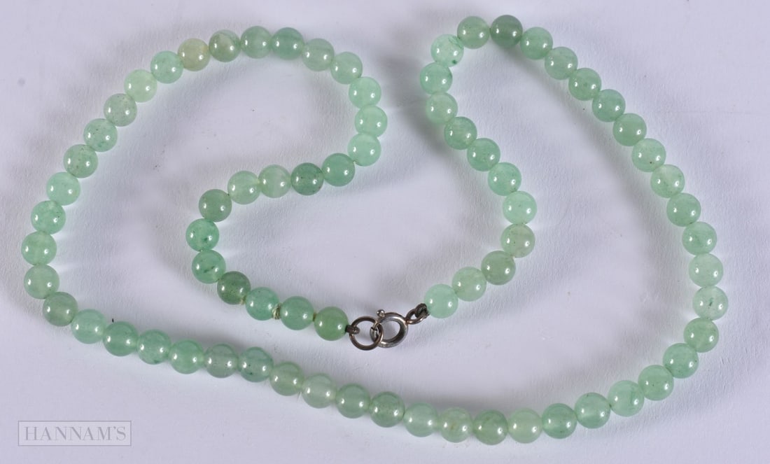 A CHINESE JADE NECKLACE. 42 cm long. (1 of 3)