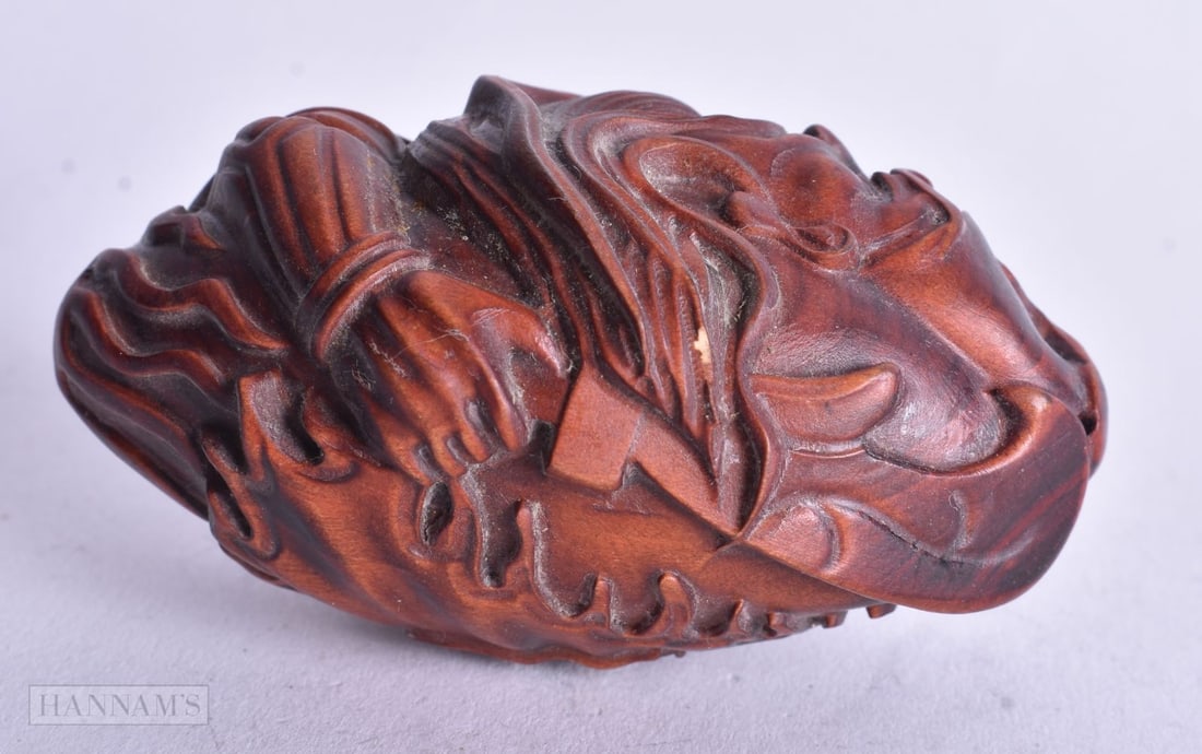 A Carved Figure of a Chinese God. 7.3cm x 4.1cm x 4.1cm, weight 42g (1 of 3)