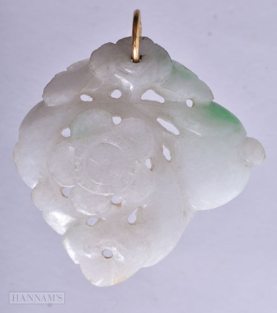 A Pierced Jade Pendant. 3.2cm x 3.4cm, weight 14.3g (1 of 2)