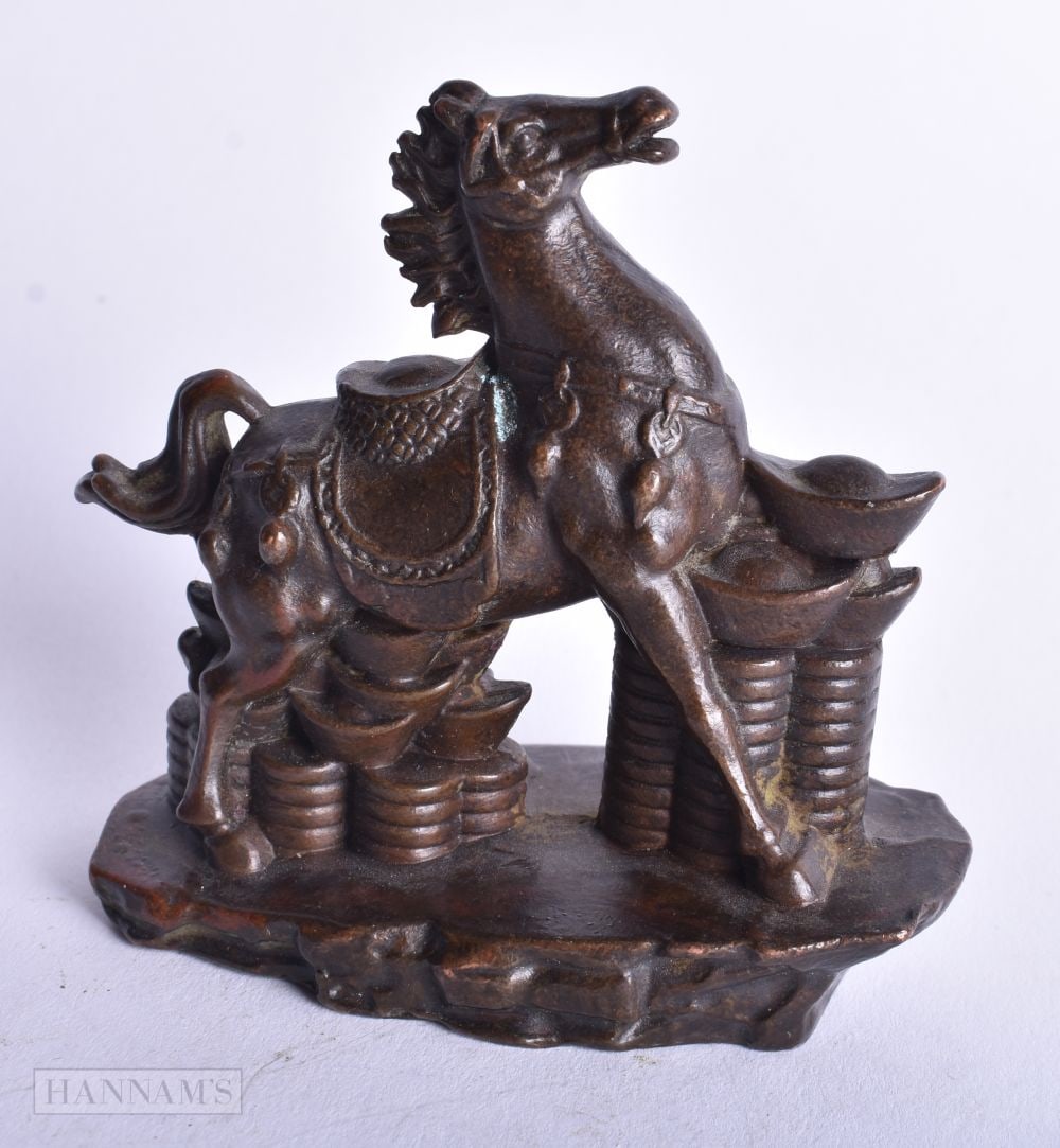 A Chinese Bronze Horse Standing on Ingots. 7.6cm x 7.9cm x 4.1cm (1 of 4)