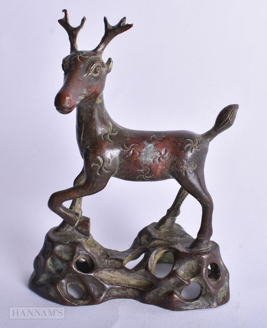 A Bronze Deer. 12cm x 8.5 cm x 4cm, weight 360g (1 of 4)
