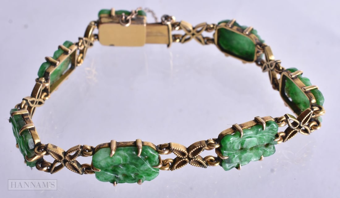 A 14 Carat Gold Mounted Jade Panel Bracelet. 17cm long, weight 13.1g (1 of 3)
