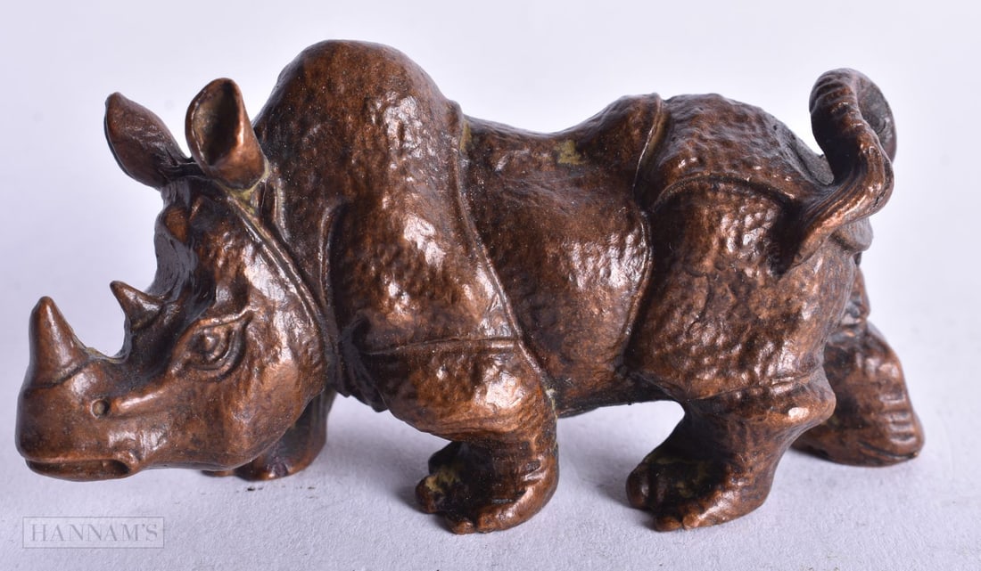 A Bronze Rhinoceros. 3.6cm x 7.5 cm x 2.7cm, weight 230g (1 of 4)