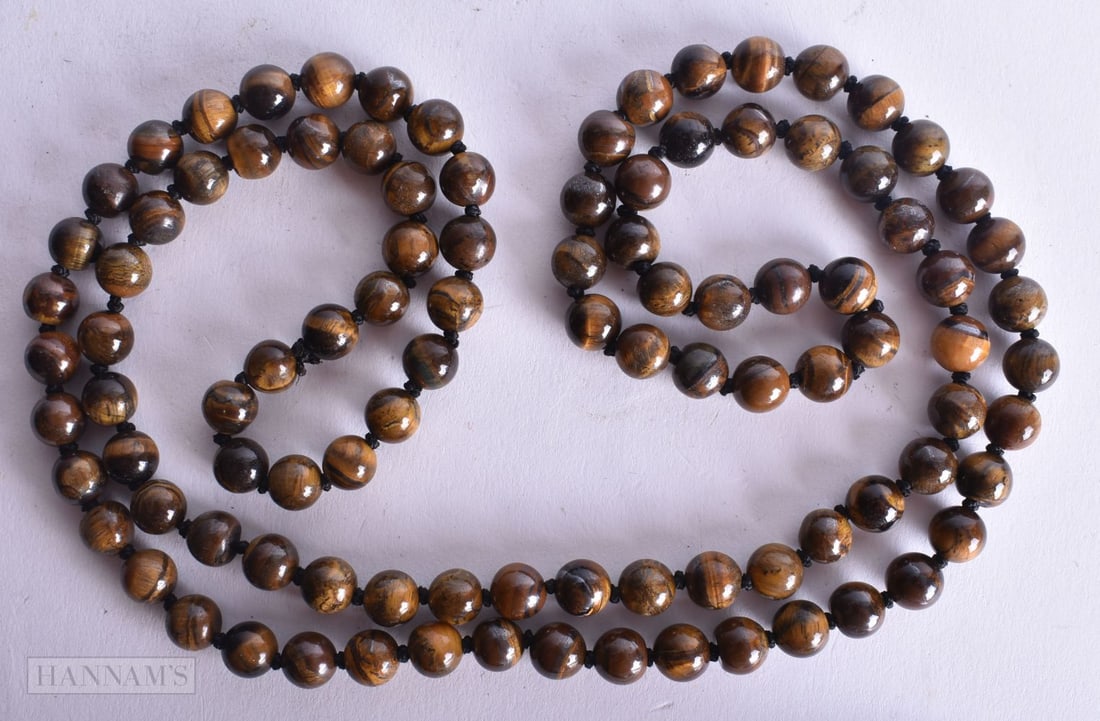 A Tigerseye Bead Necklace. Length 94cm, Bead Size 8mm, weight 85g (1 of 3)