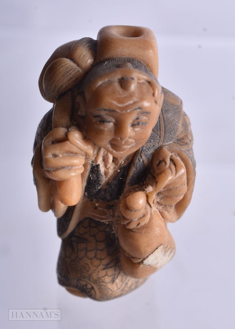 A Carved figure of a Chinese Immortal. 3.7cm x 2.1cm x 2cm, weight 9.3g (1 of 4)