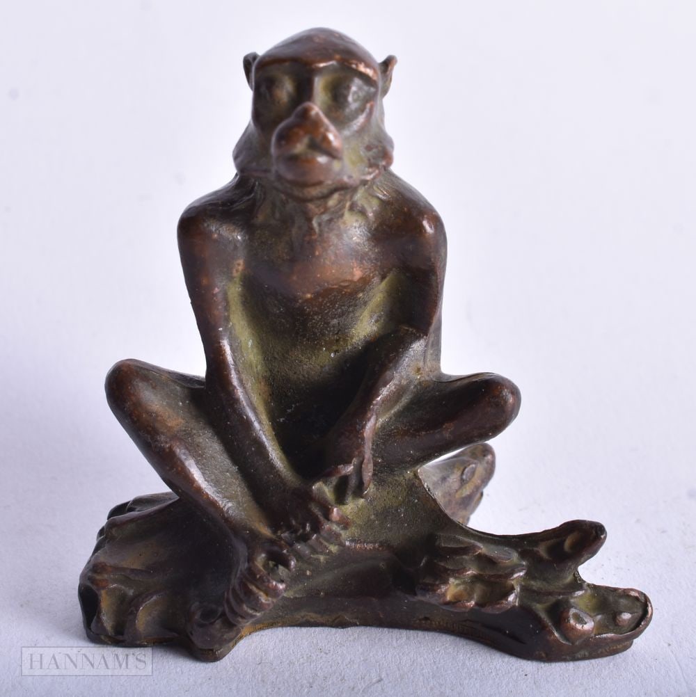 A Bronze Seated Monkey. 5.7cm x 5.5 cm x 3.4cm, weight 158g (1 of 4)