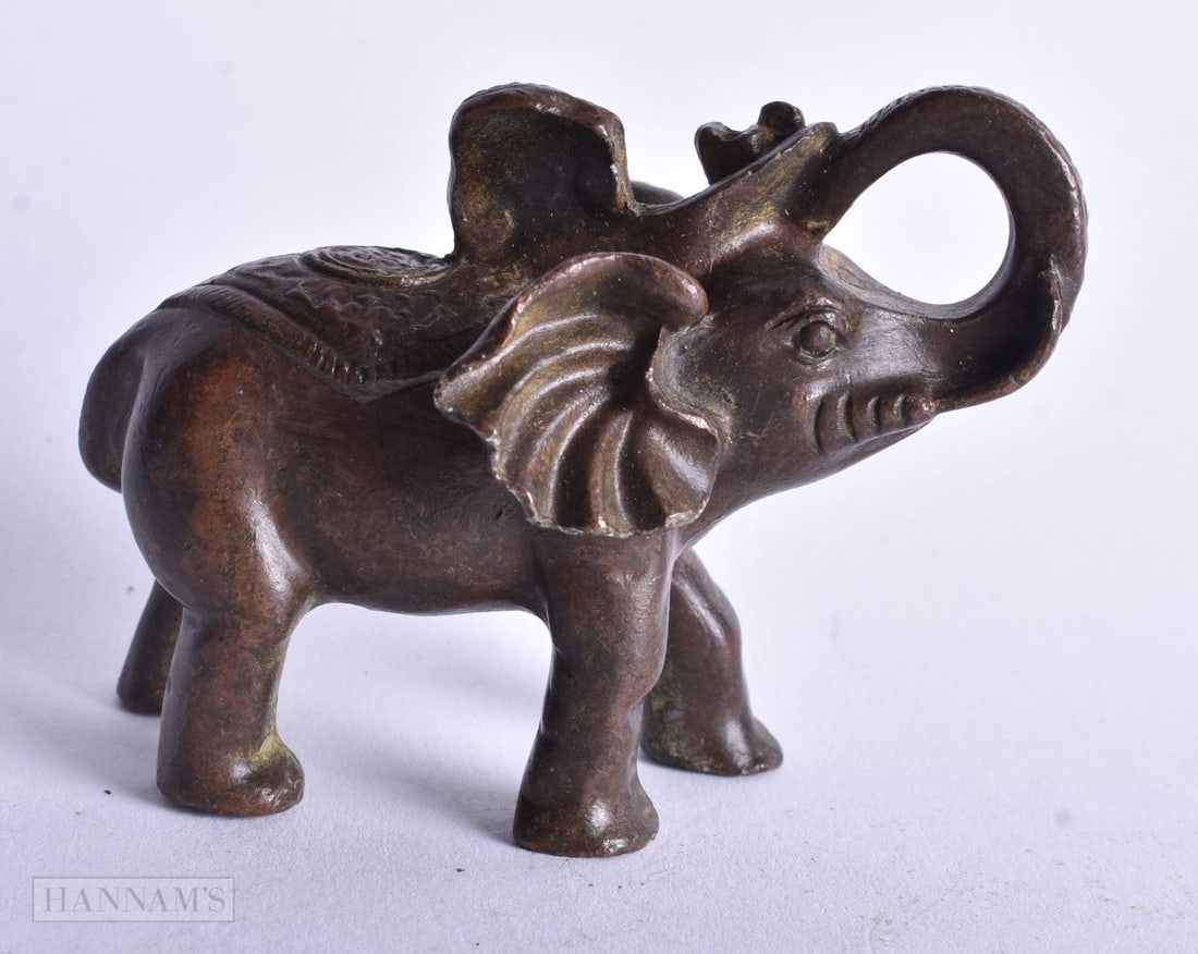 A Bronze Elephant with Raised Trunk. 6 cm x 7.5 cm x 4.5 cm, weight 310g (1 of 4)