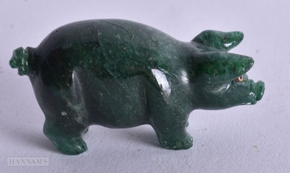 A Carved Jade Pig with Diamond and Gold Set Eyes. 2.4cm x 4.9cm x 2cm, weight 26.5g (1 of 4)