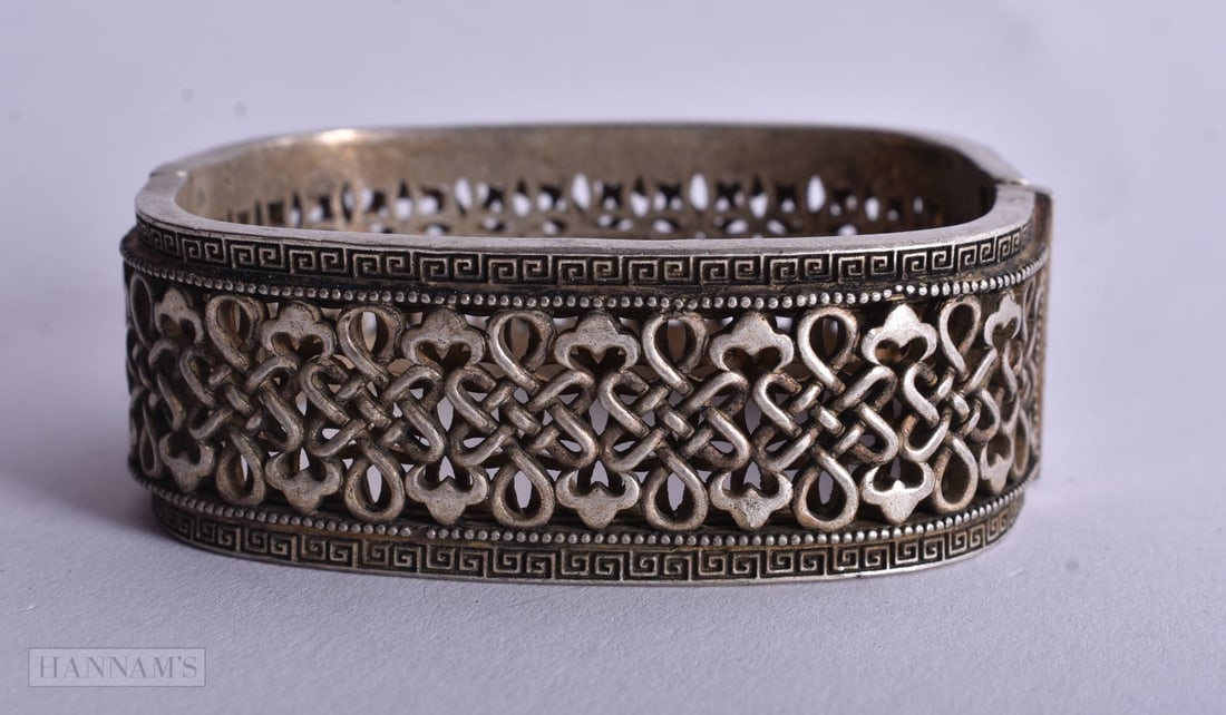 A Chinese White Metal Cuff Bangle. 5.1cm x 6.1cm, weight 79g (1 of 3)