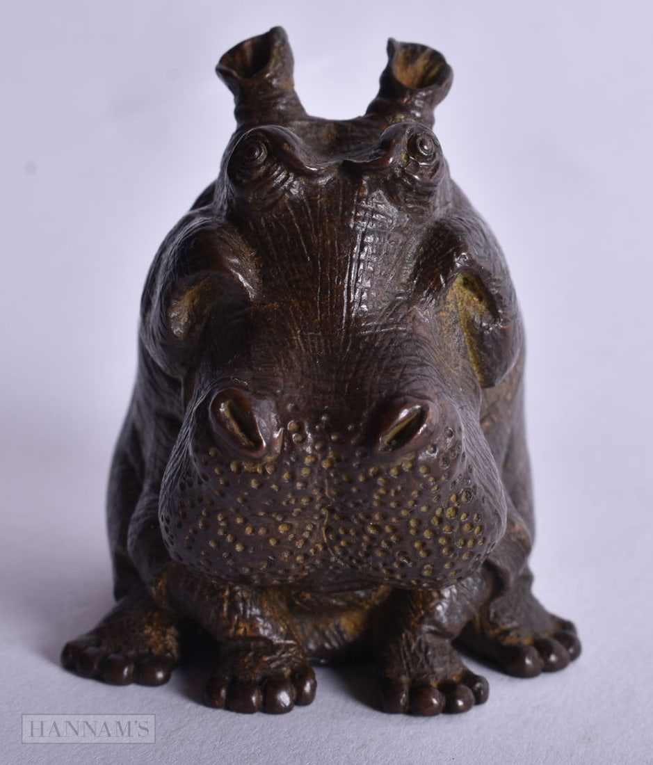 A Bronze Hippopotamus. 6.2cm x 5.1cm x 6.7cm, weight 670g (1 of 4)