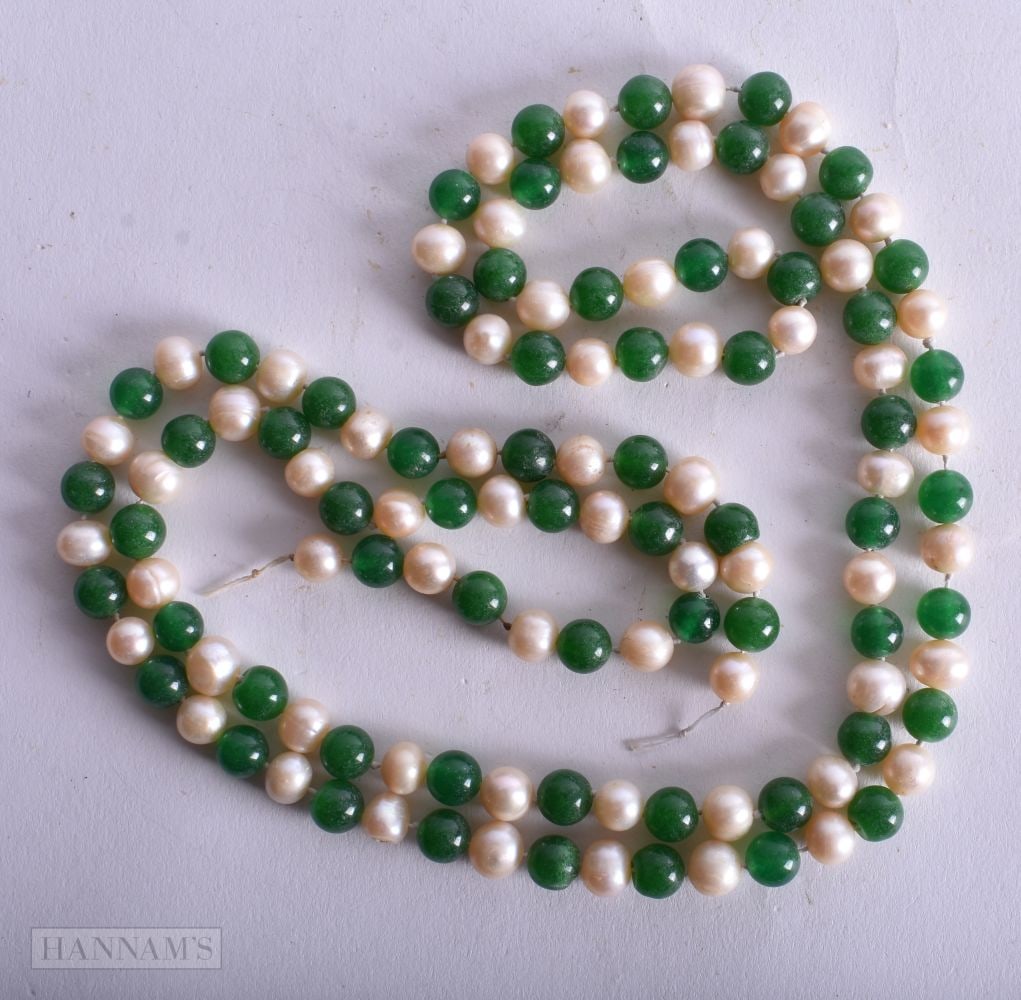 A Hardstone Beaded Necklace. Bead Size 8mm, Length 106cm, weight 90g (1 of 3)