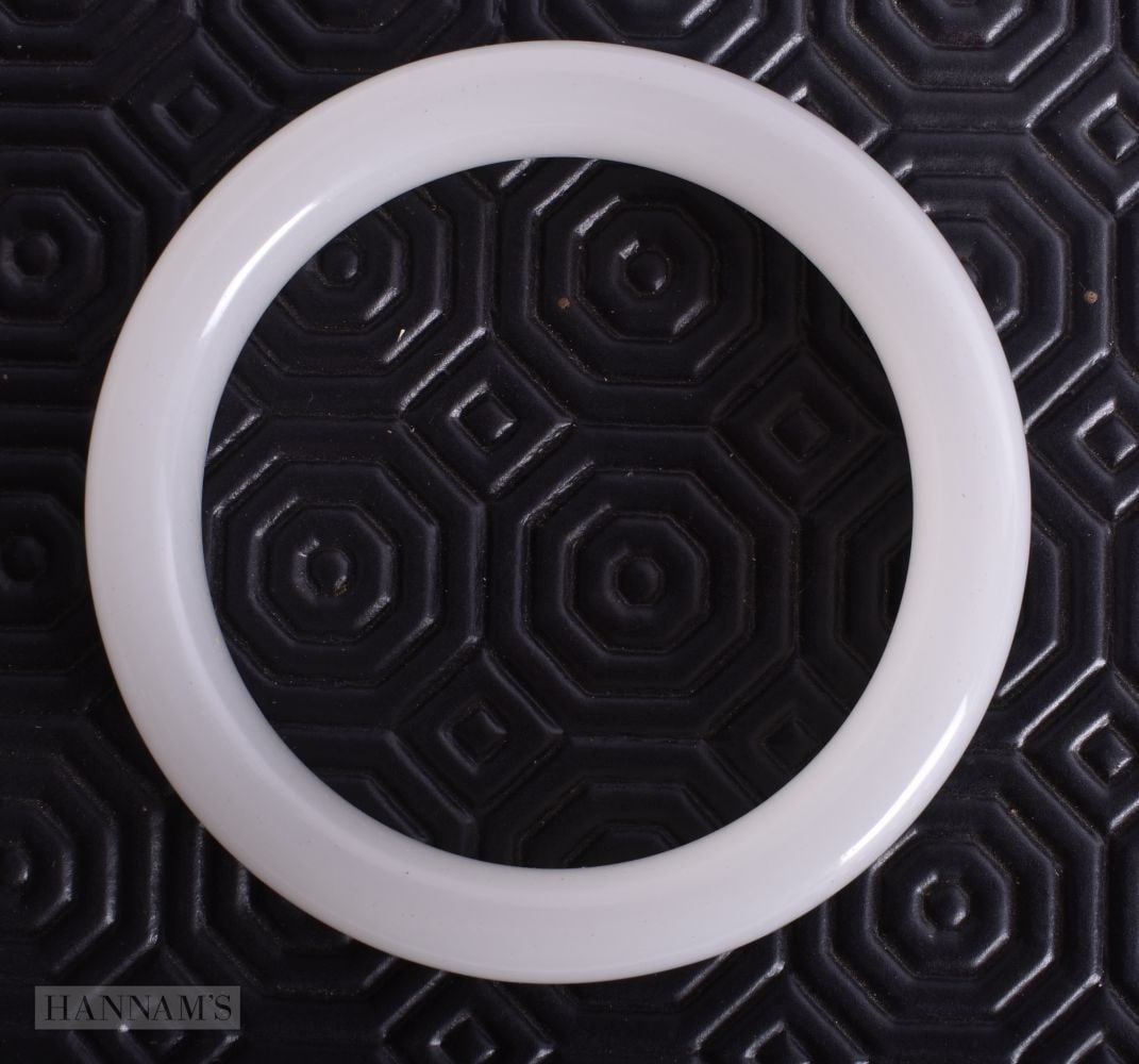 A White Hardstone Bangle. Internal Diameter 6.2cm, weight 58g (1 of 3)