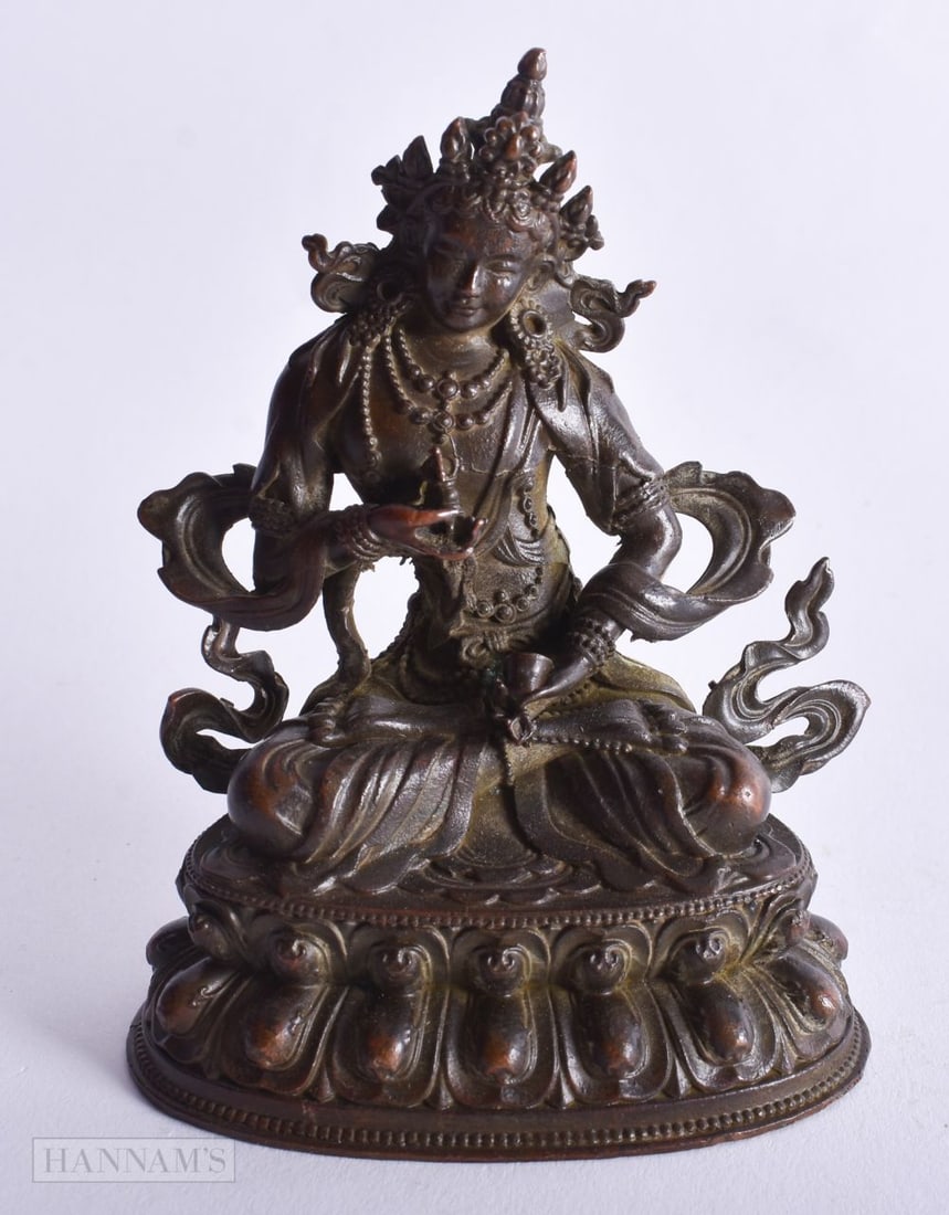 A Sino Tibetan Bronze Boddhisatva Tara figure. 9.4cm x 7.4cm x 5.5 cm, weight 326g (1 of 3)