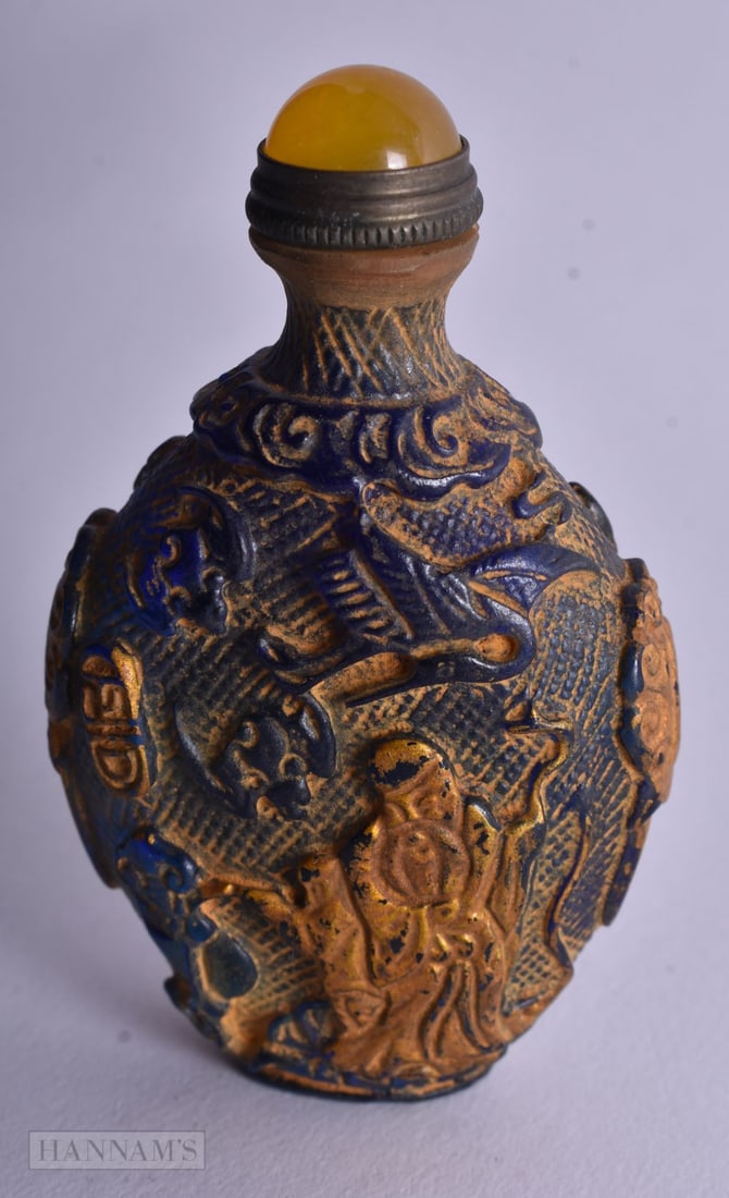 A Peking Glass Snuff Bottle. 7.7cm x 4.7cm x 2.6cm, weight 103.1g (1 of 4)