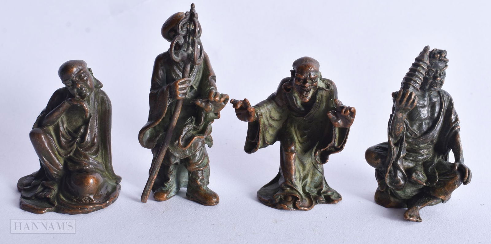 Four Bronze Figures in various poses. Largest 5.1cm x 3cm x 2.5 cm, total weight 277g (4) (1 of 4)
